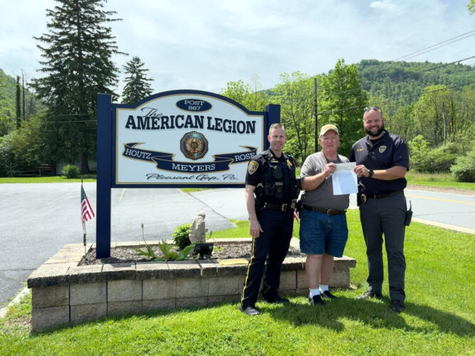 American Legion Post 867 presents donation to Spring Township Police